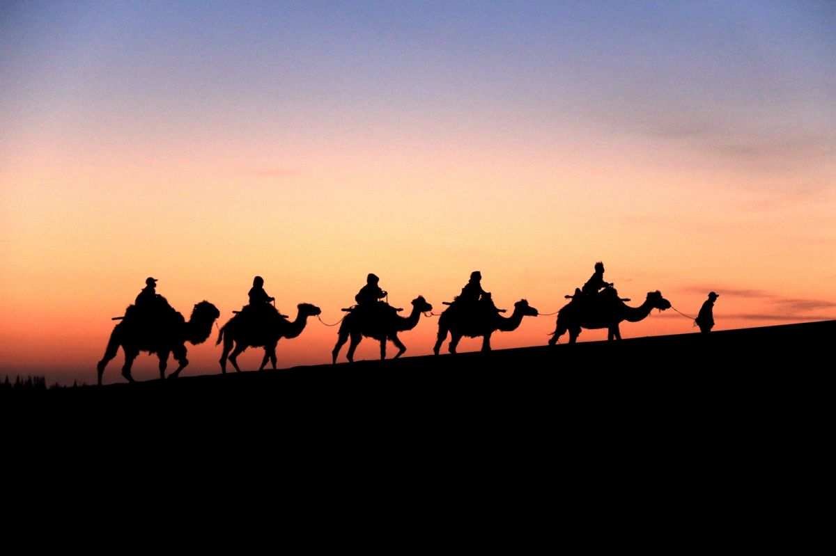 Chasing Caravans: A Journey from the Start of the Silk Road to its Desert Oasis